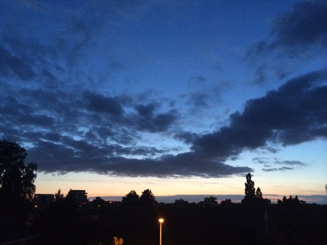 Clouds giving a nice contrast against the beautifully colored sky above Enschede