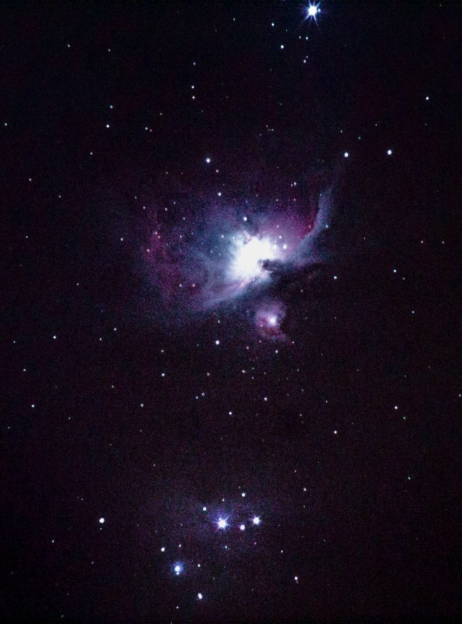 M42 taken with DSLR and tracking mount through a thin layer of clouds